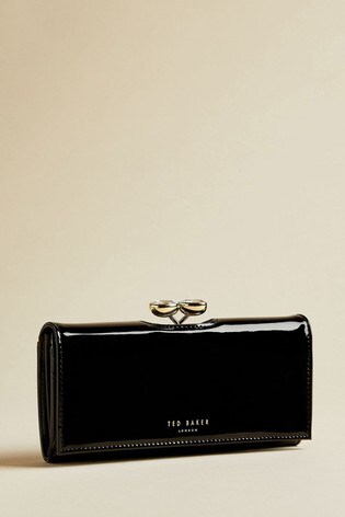 black shiny ted baker purse