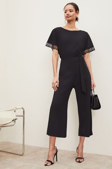 ui coupon steek Buy Lipsy Lace Trim Culotte Jumpsuit from the Next UK online shop