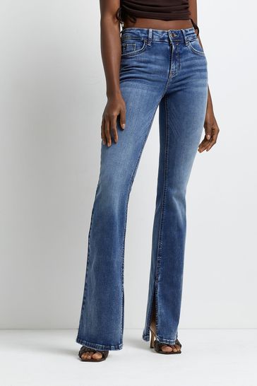 Buy River Island Denim Medium Amelie Mid Rise Flared Jeans from Next ...