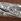 Silver Tone Ted Baker Torvi: Crystal Twist Hinged Bangle Bracelet