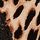 Bruin met luipaardprint
