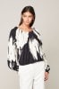 Black/White Floral Print Long Sleeve Tie Back Bubblehem Top