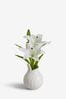 White Artificial Lily In White Pleat Ceramic Vase