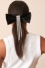 Black Bow Hair Clip With Statement Sparkle Drape
