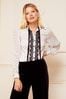 Love & Roses Ivory White and Black Tie Neck Trim Long Sleeve Blouse