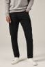 Schwarz, Unifarben - Klassische Stretch-Jeans in Slim Tapered Fit