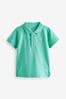 Grün - Kurzärmeliges Polo-Shirt, Uni (3 Monate bis 7 Jahre)