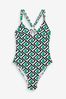 Grün mit geometrischen Muster - Tief ausgeschnittener, bauchformender Badeanzug mit Riemchendesign hinten und Bügeln