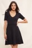 Friends Like These Black Petite Short Sleeve Scoop Neck Knitted Fit and Flare Dress, Petite