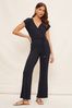Frequently Asked Questions Navy Jersey Wide Leg Wrap Style V Neck Summer Jumpsuit, Regular