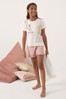 <span>Weiß und pink</span> - Lipsy Kurzer Pyjama mit Rüschen