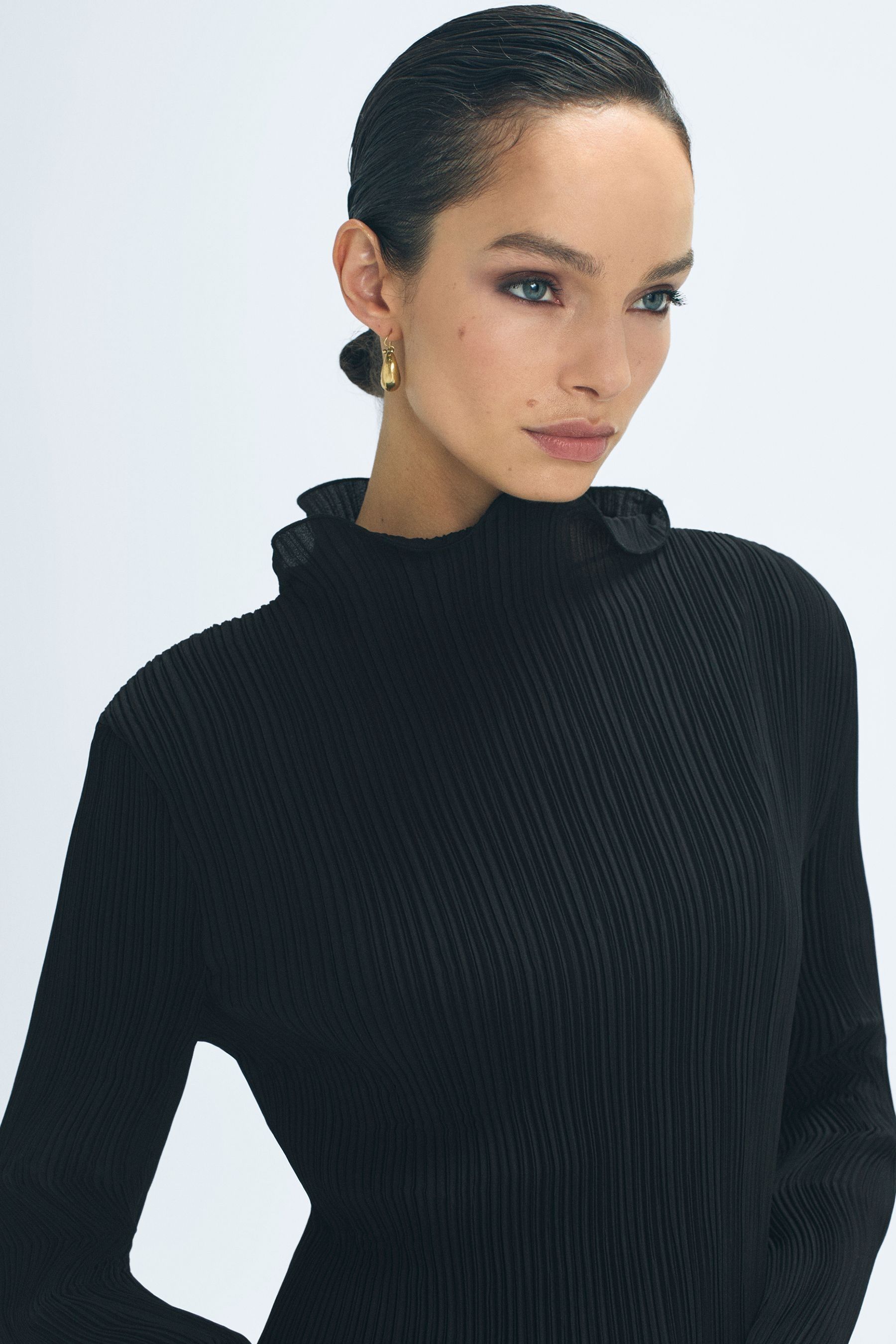 Atelier Fitted Ribbed Ruffle Neck Top In Black