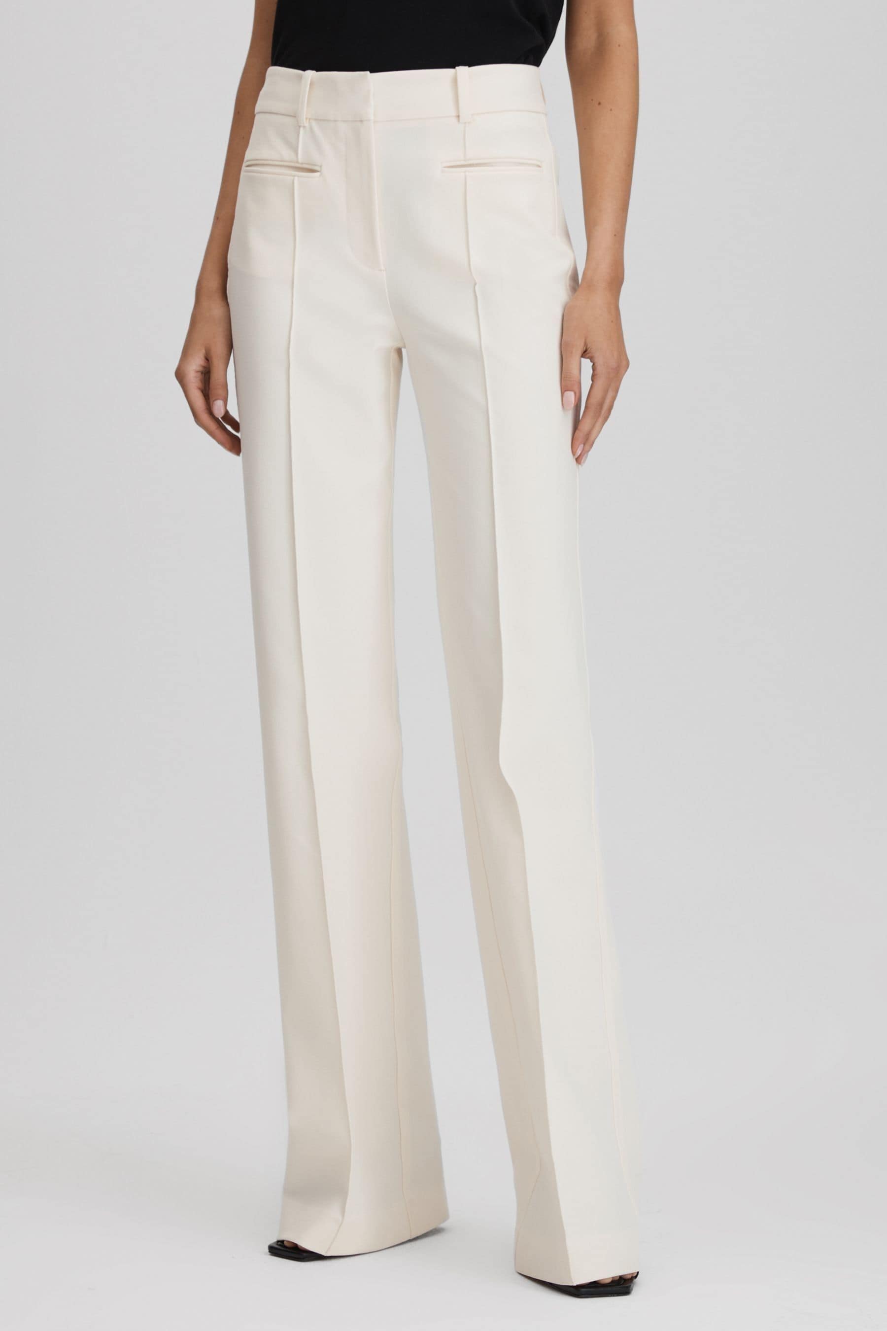 Reiss Claude Pinched-seam Flared-leg High-rise Stretch-woven Trousers In Cream