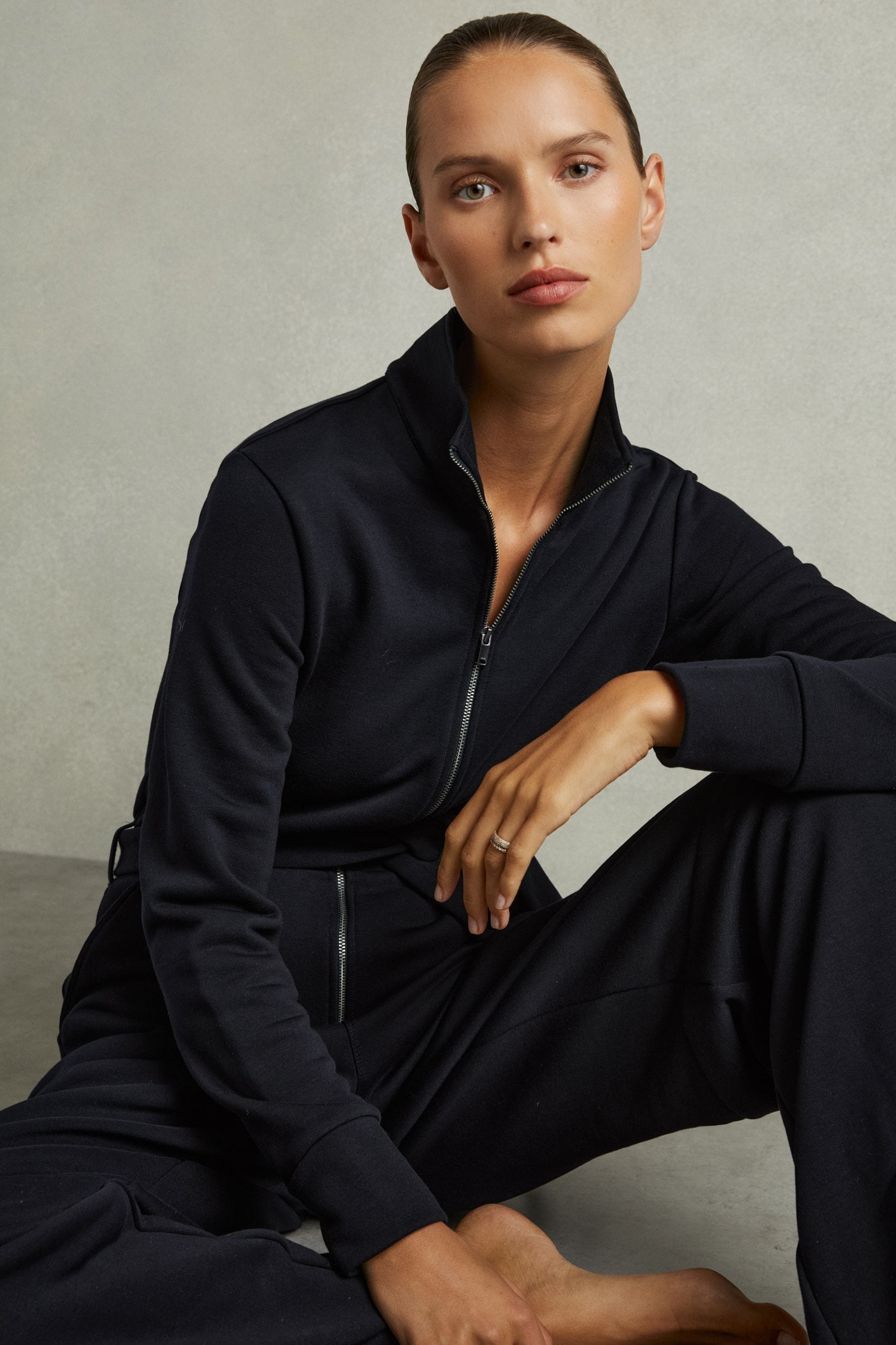 REISS NAVY NINA BELTED LOOPBACK-JERSEY JUMPSUIT