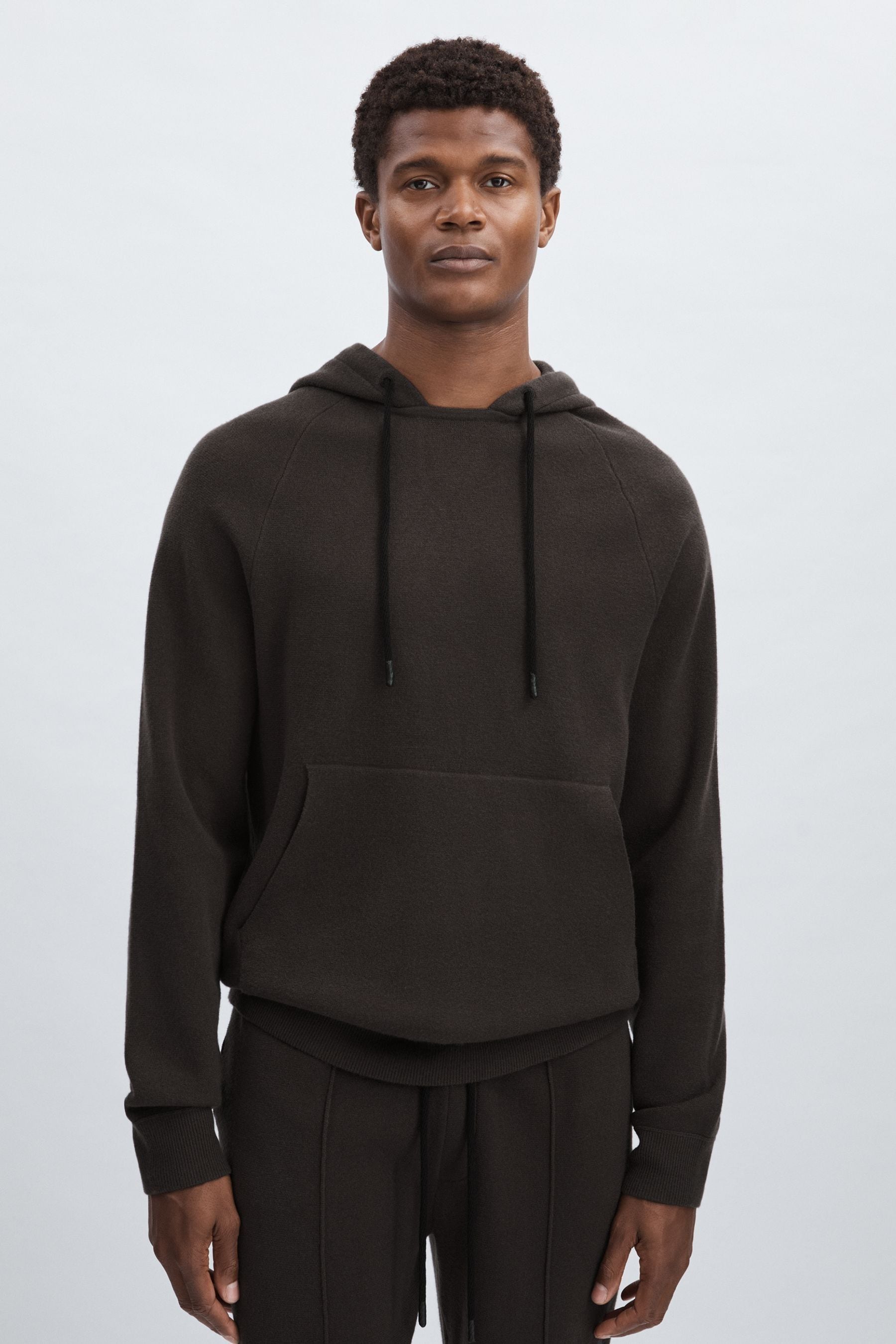 Paige Drawstring Knitted Hoodie In Dark Grey