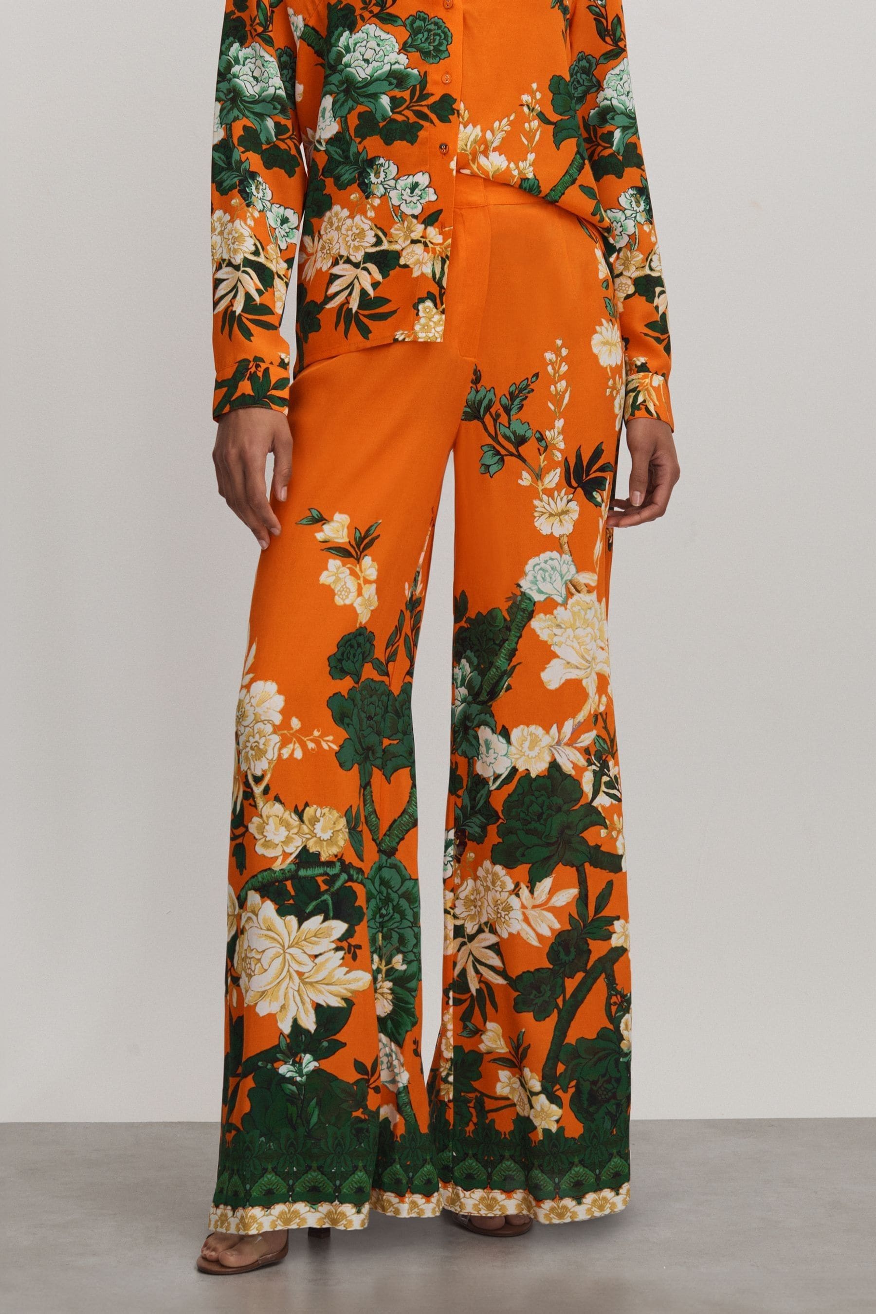 Shop Raishma Silk Printed Wide-leg Trousers In Orange