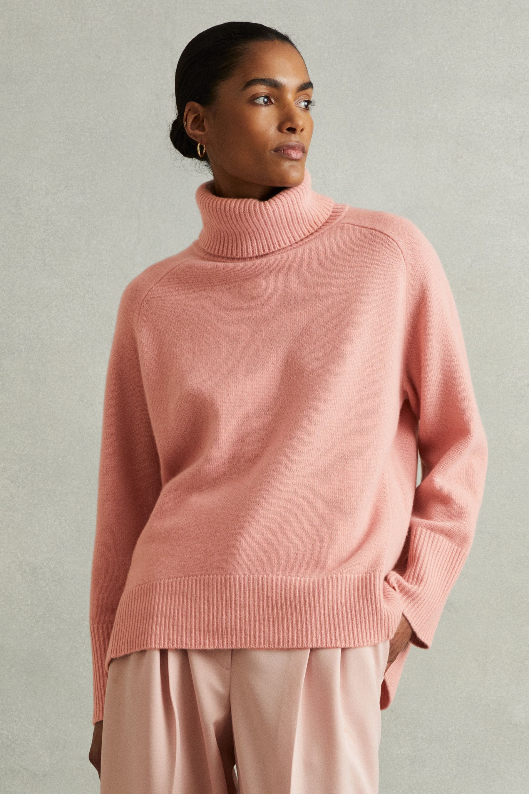 Woolen roll neck jumper 2025