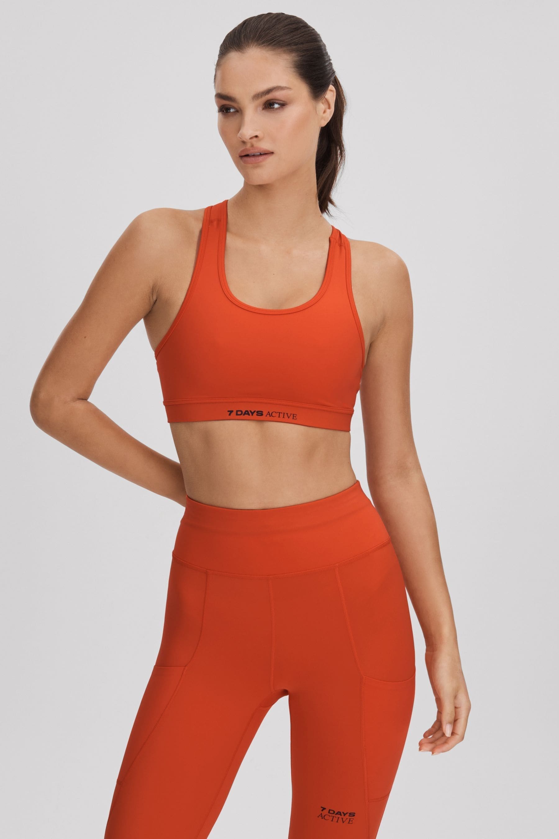 Shop 7 Days Active Racerback Sports Bra In Tomato Red