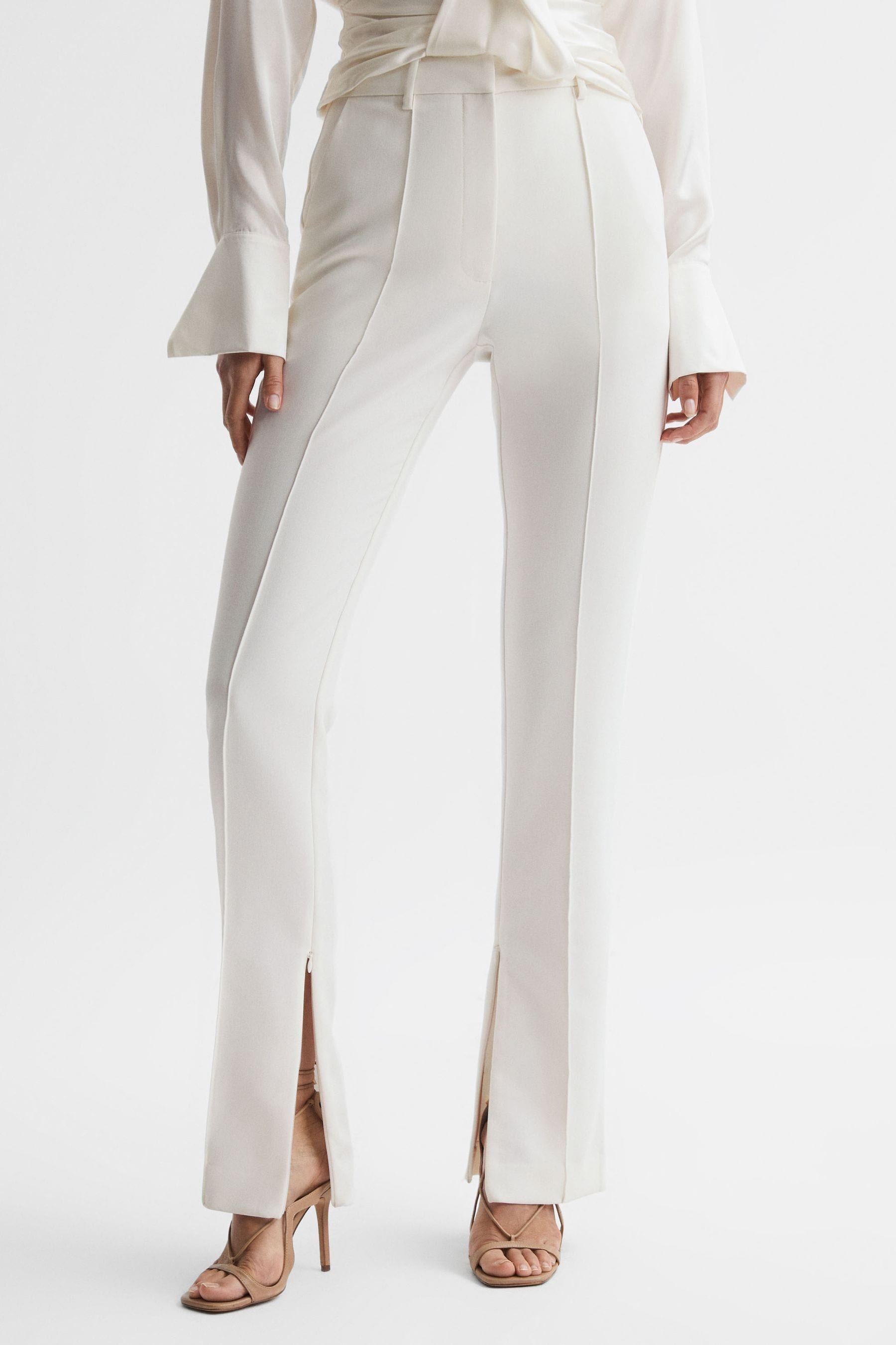 Shop Acler Tailored Split Hem Trousers In Ivory
