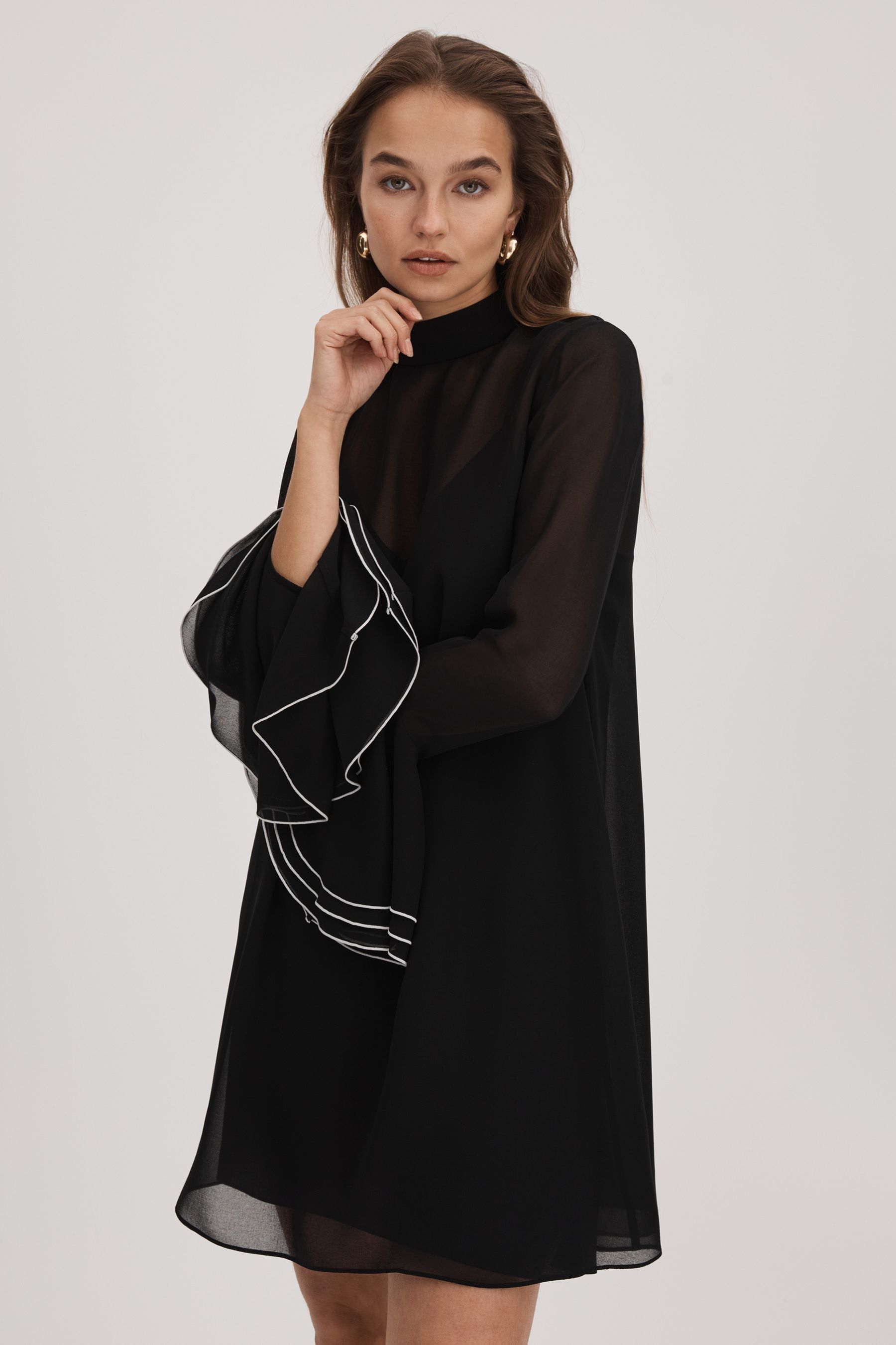 Florere Sheer Fluted Cuff Mini Dress In Black