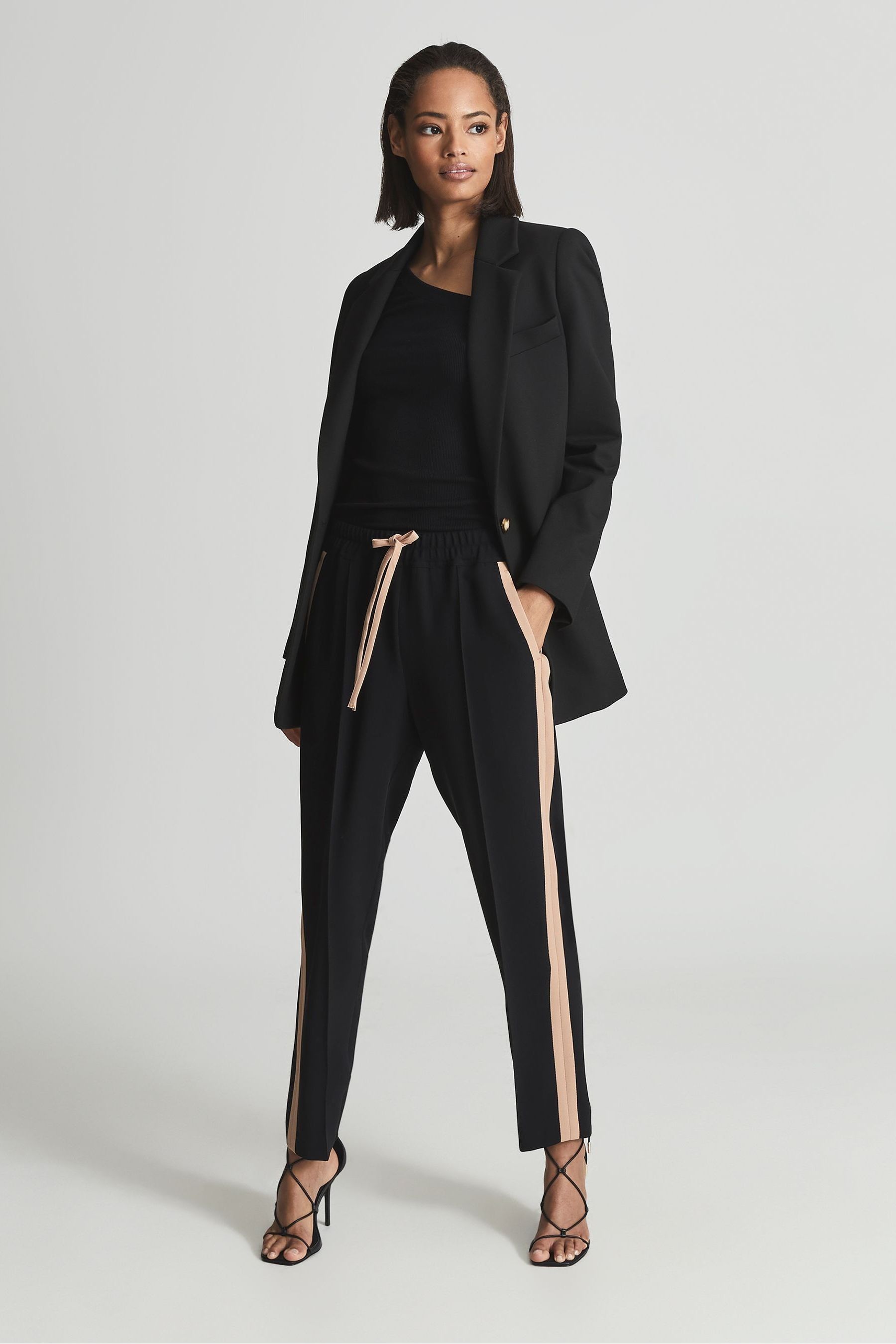 Side stripe sale black trousers