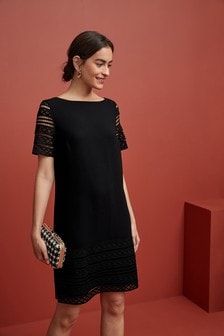 next red and black dress