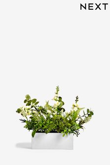 Green Artificial Flowers In Window Box