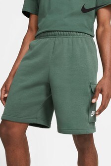 green nike shorts