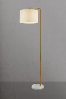 gold floor lamp next