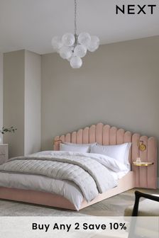 Soft Velvet Blush Pink Adele Upholstered Hotel Bed Frame with Ottoman Storage, Bedside Tables and Lights'