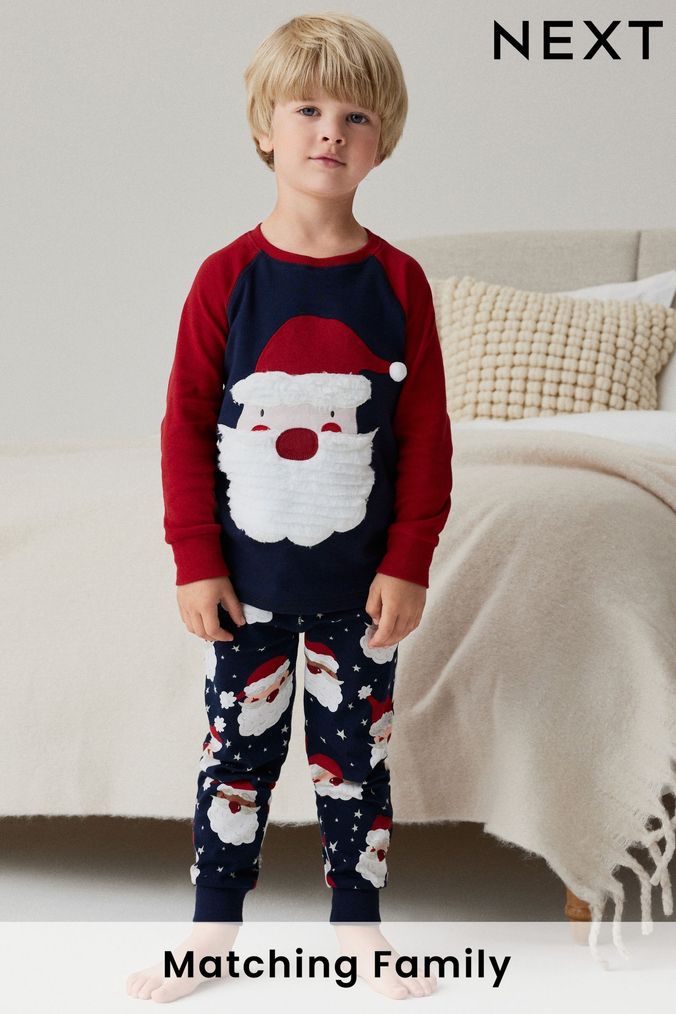 Navy Santa Christmas Snuggle Pyjamas (9mths-12yrs) (164409) | £13 - £18