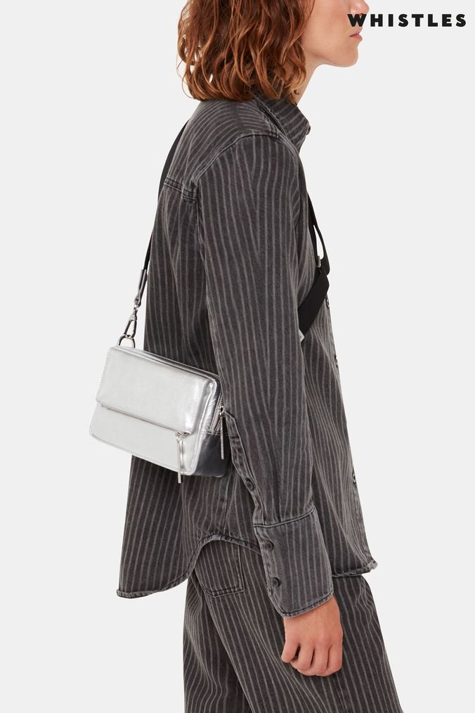 Whistles store silver clutch
