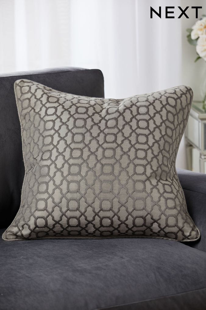 Grey and store silver cushions
