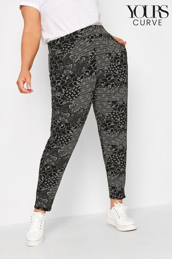 Yours Curve Black Printed Double Pleat Harem Trousers (420046) | £27
