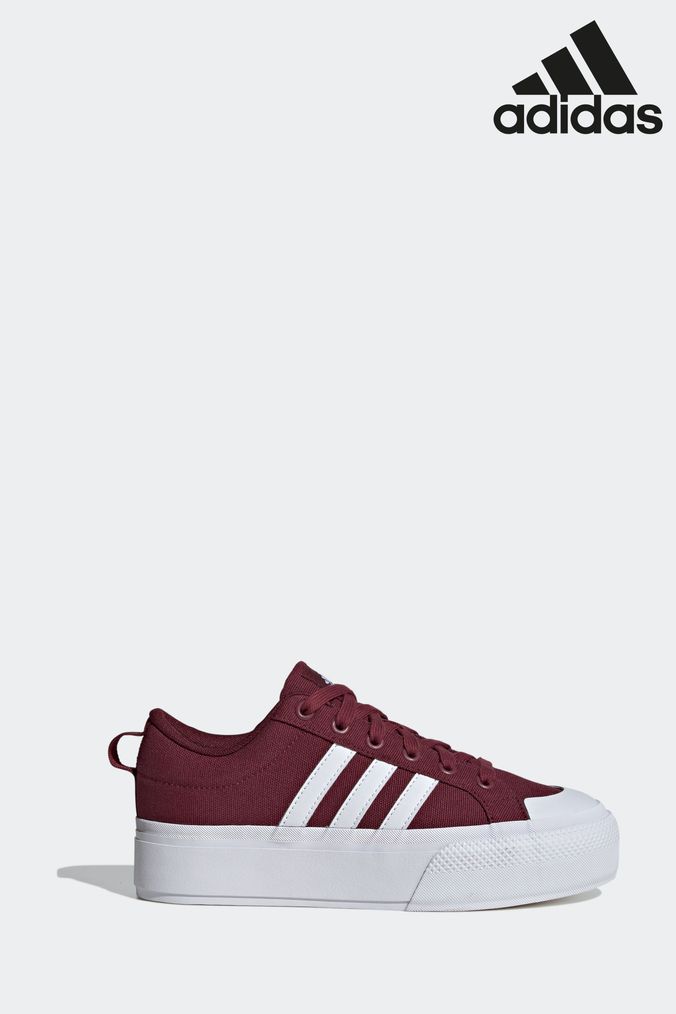 Adidas red 2025 stripe trainers