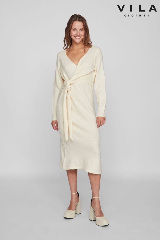 Cream knitted dress uk top