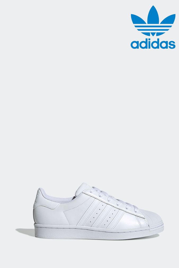 Ladies white adidas trainers 2025