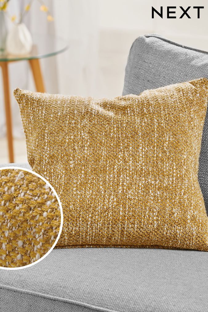 Mustard coloured throws and sales cushions