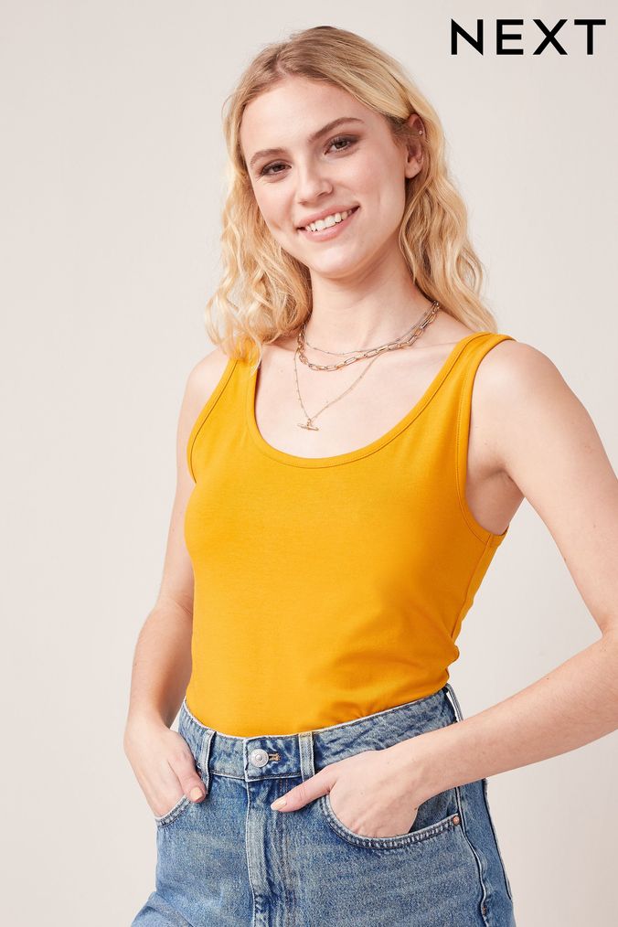 Pale yellow shop vest top