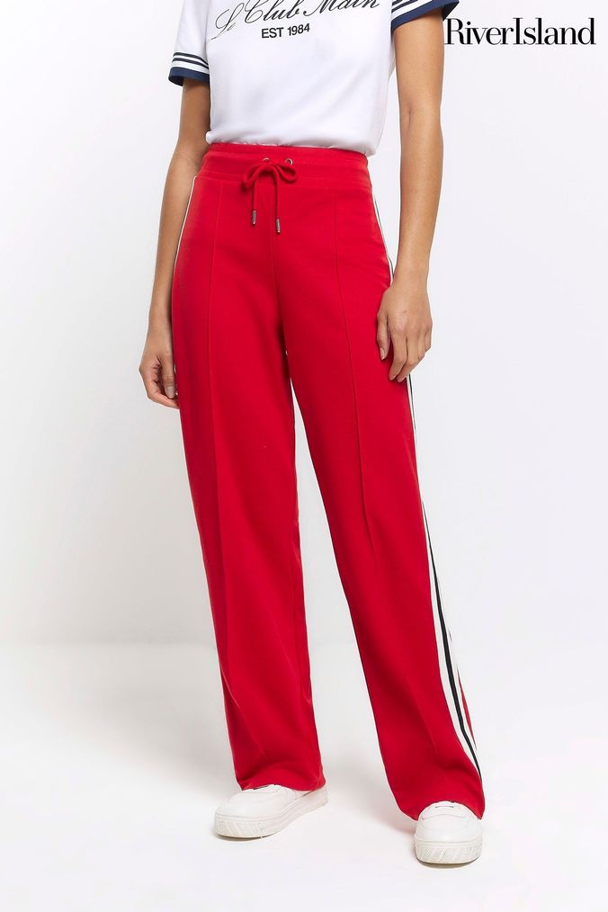 Womens red joggers with white stripe hotsell