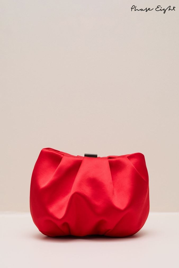 Red clutch bag next store