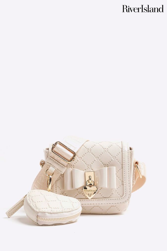 Ladies cream handbags top