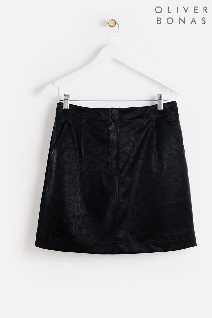 Women in leather mini skirts on sale