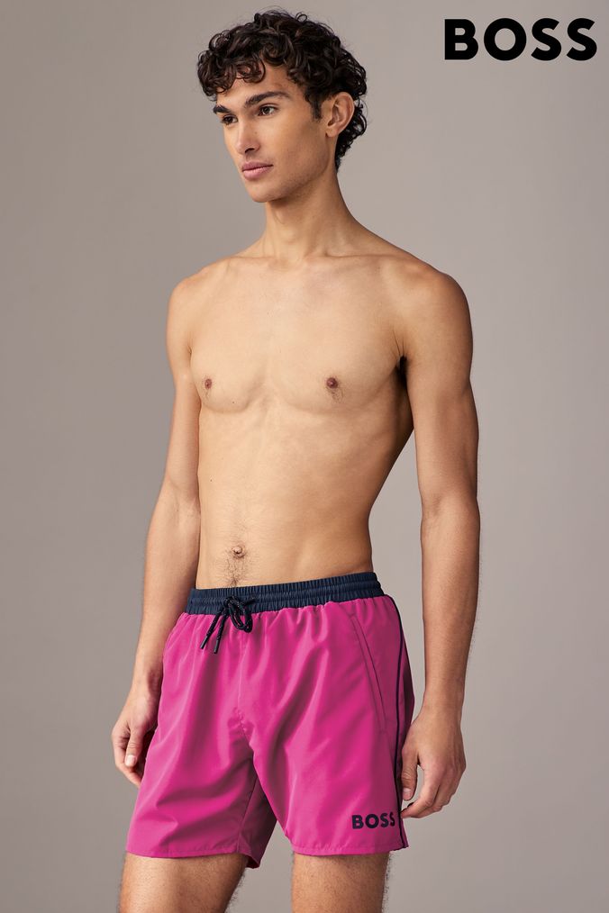 Hot pink swim trunks top