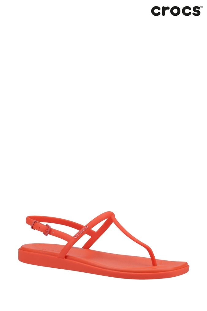 Red sparkle flip flops top