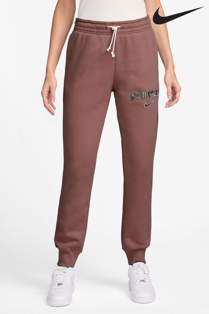 Rose gold nike joggers deals