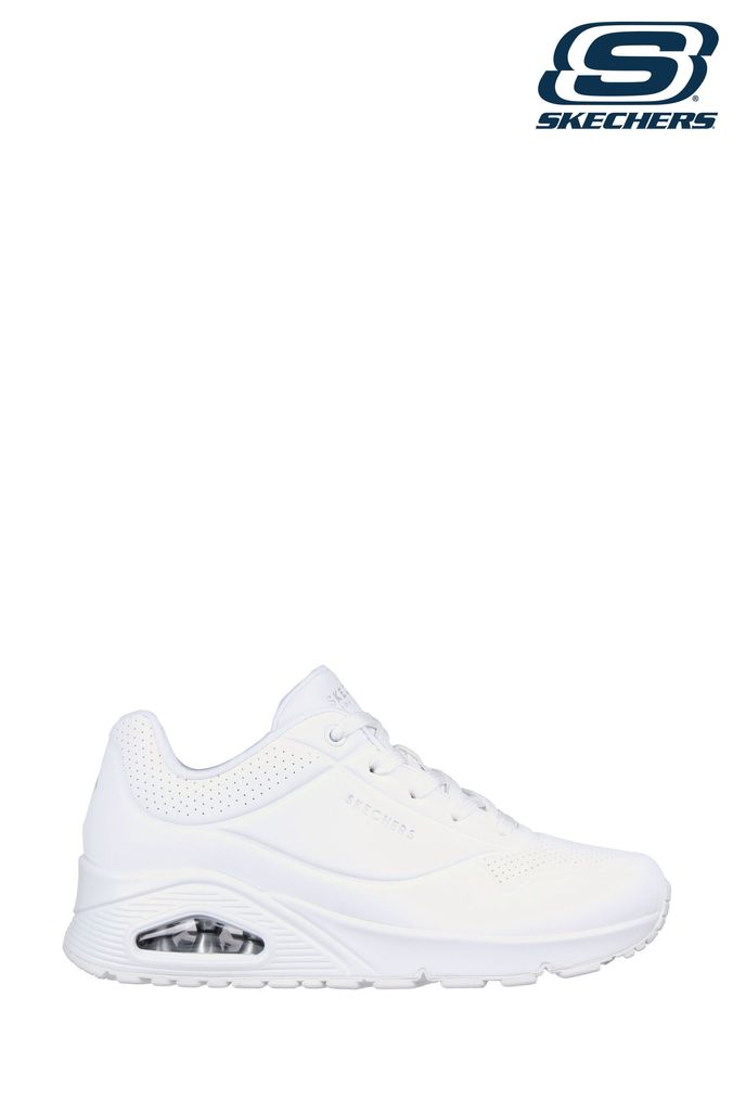 Solid white skechers shop