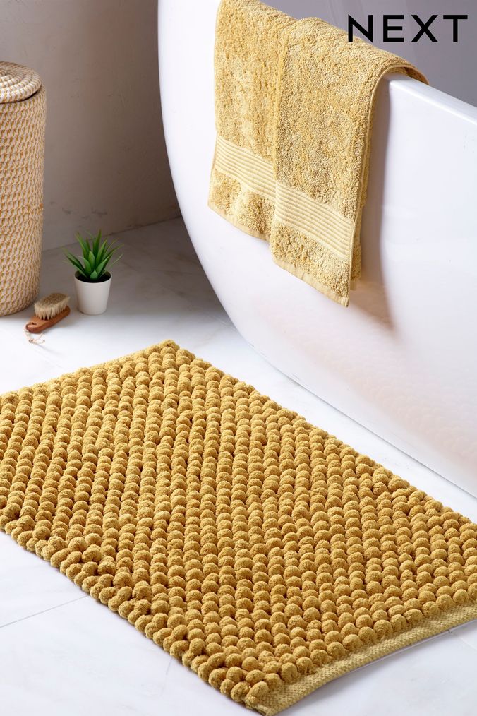 Yellow bath mats and towels sale