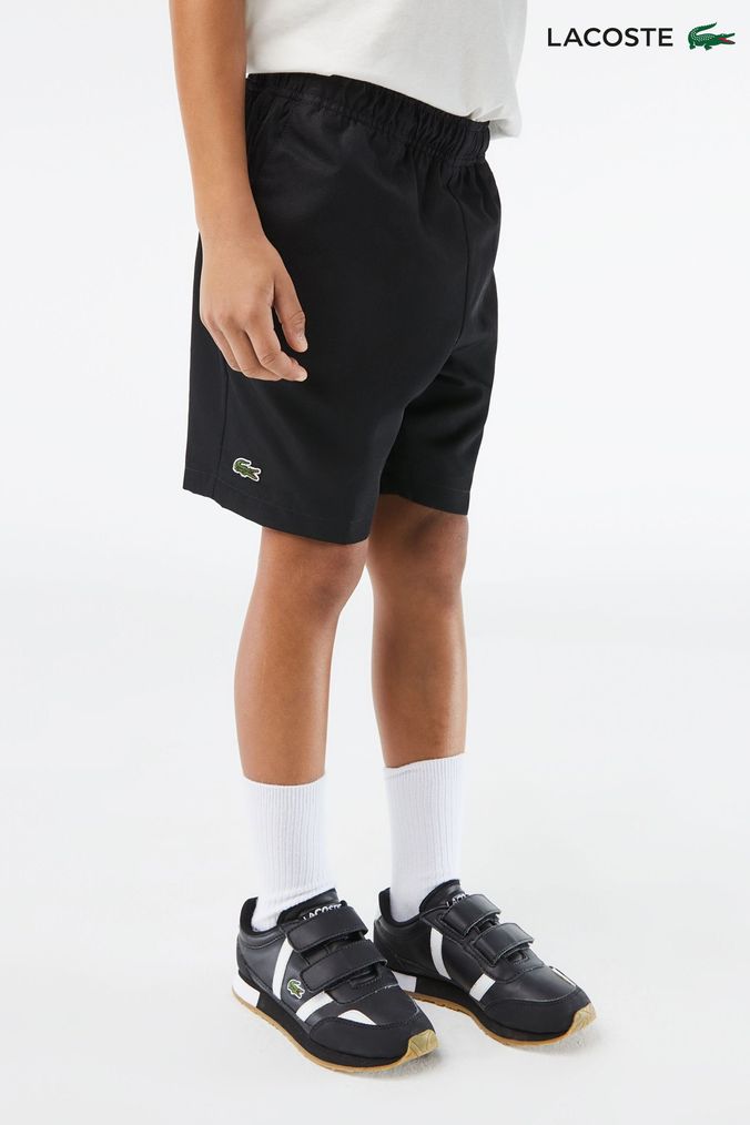 Boys black lacoste shorts on sale