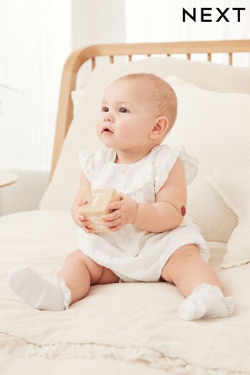 White Broiderie Baby Playsuit (0mths-2yrs) (C68672) | £17 - £19